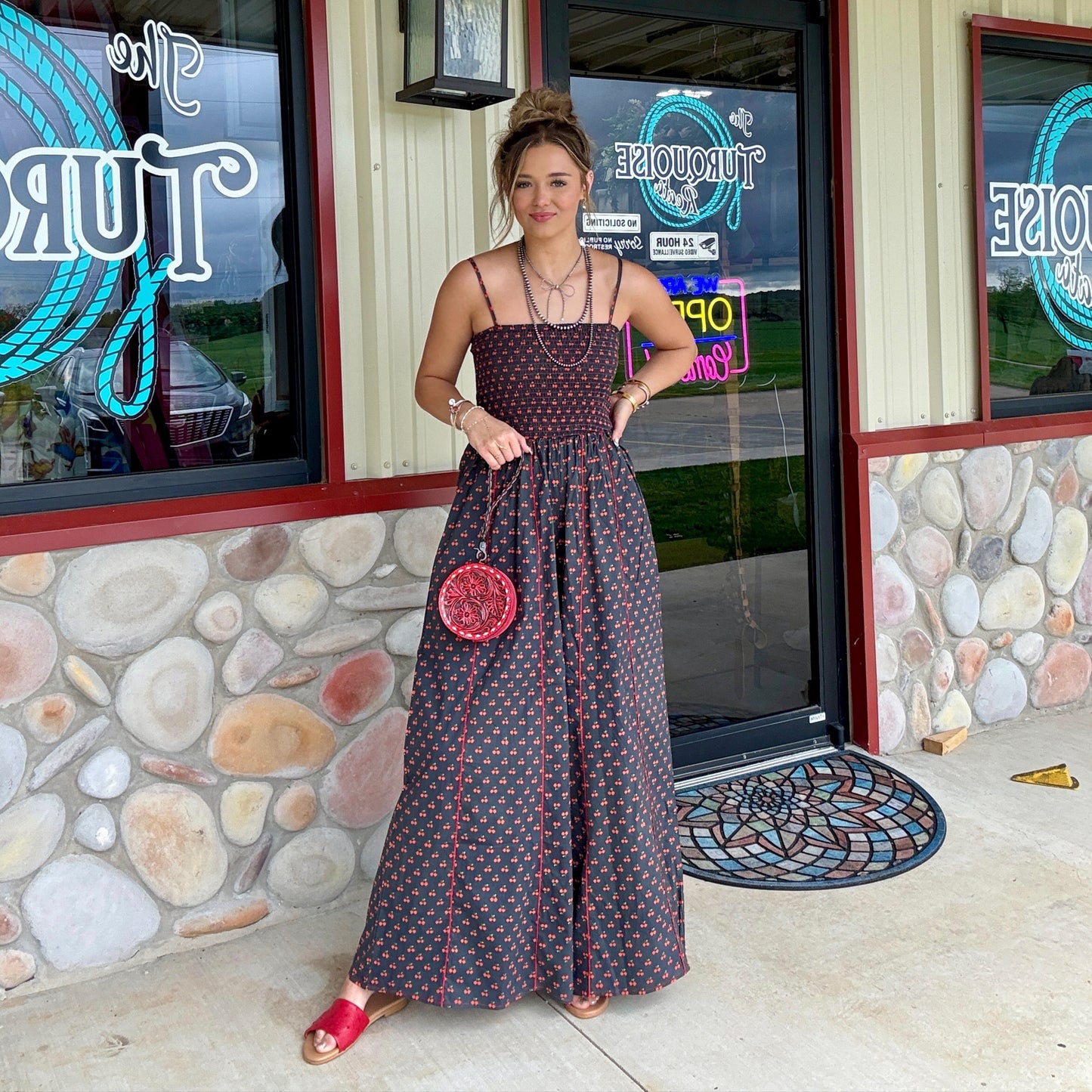 The Cherry Bomb Smocked Jumpsuit