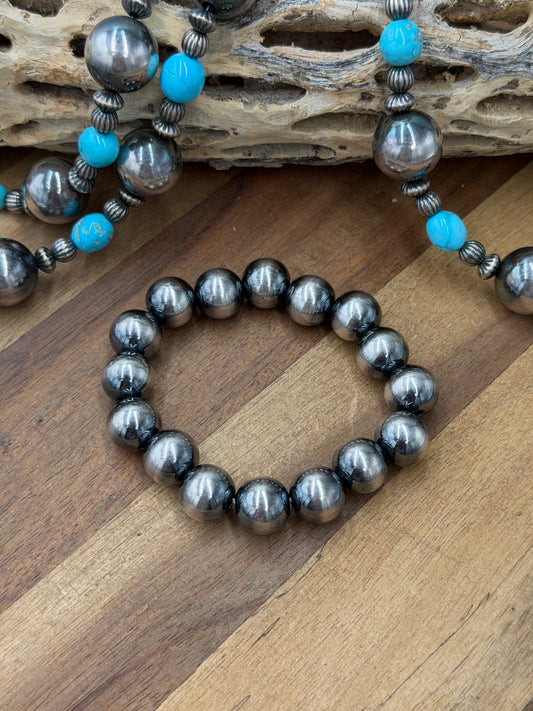 12mm #92-20 Sterling Silver Pearl Stretchy Bracelet
