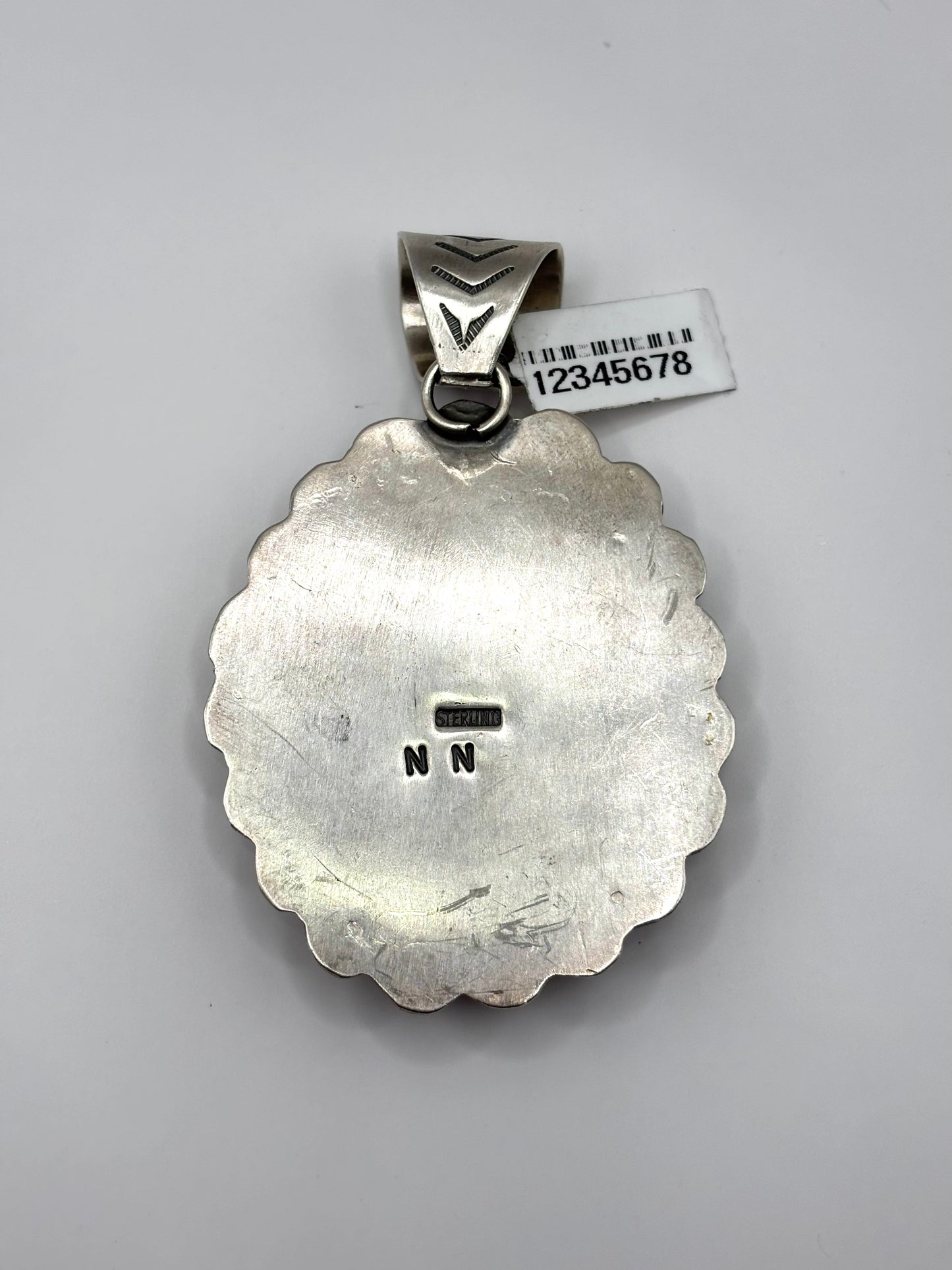 Pink Conch and Black Onyx Pendant by Ned Nez