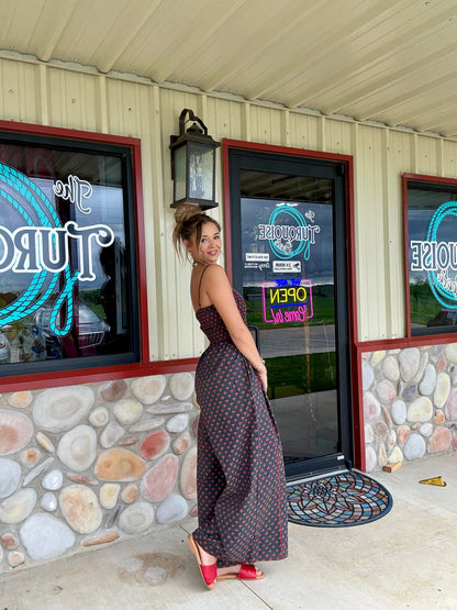 The Cherry Bomb Smocked Jumpsuit