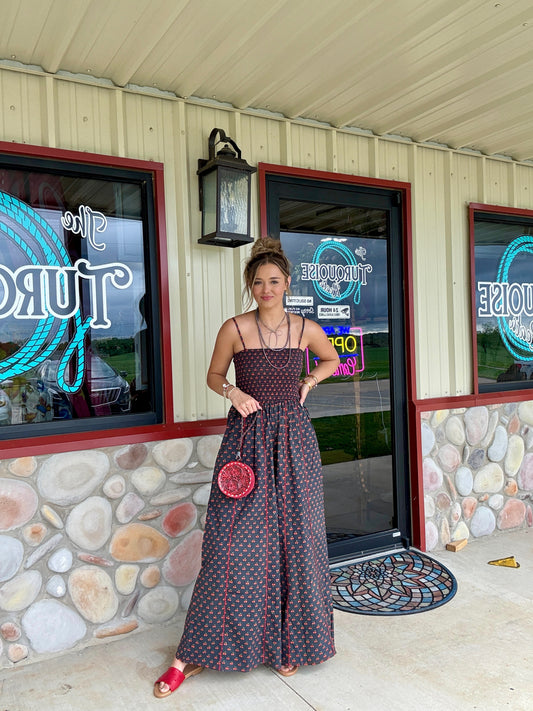 The Cherry Bomb Smocked Jumpsuit