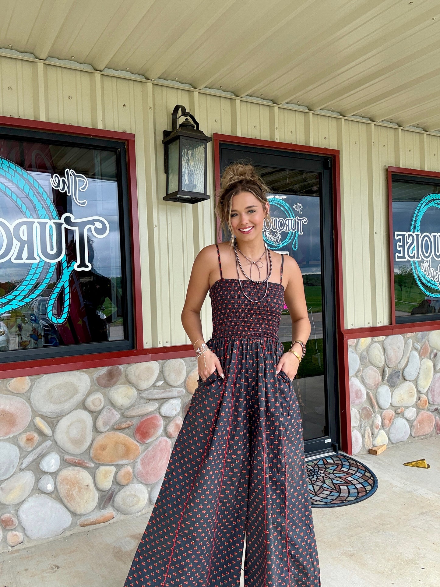 The Cherry Bomb Smocked Jumpsuit
