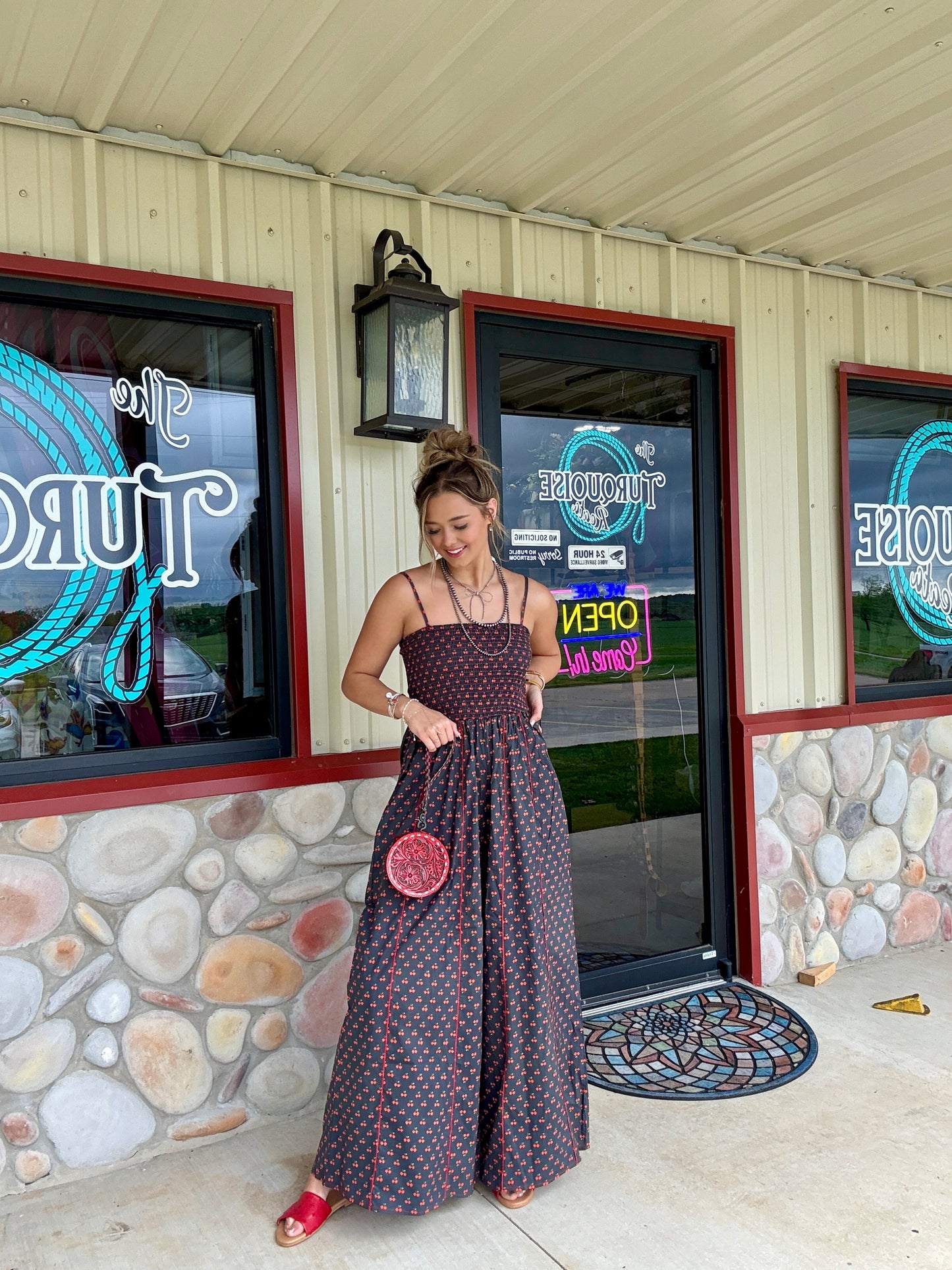 The Cherry Bomb Smocked Jumpsuit