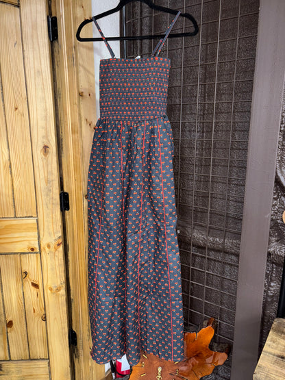 The Cherry Bomb Smocked Jumpsuit