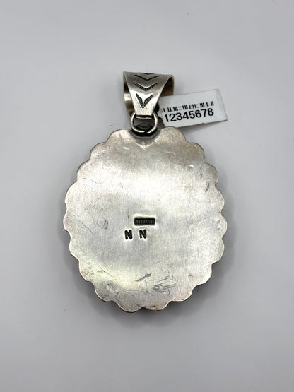 Pink Conch and Black Onyx Pendant by Ned Nez