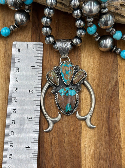 Turquoise Naja Pendant by Ned Nez, Navajo
