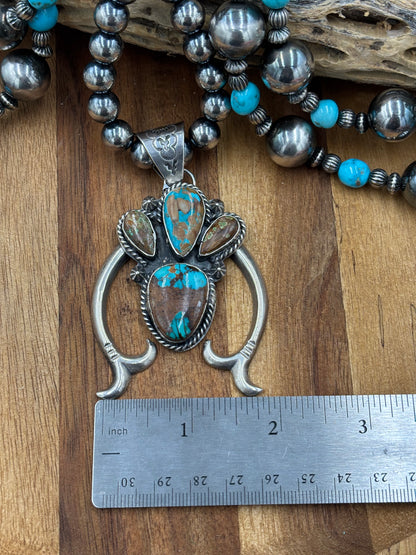 Turquoise Naja Pendant by Ned Nez, Navajo