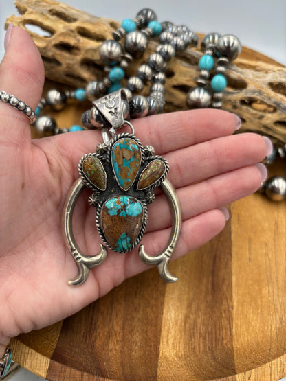 Turquoise Naja Pendant by Ned Nez, Navajo