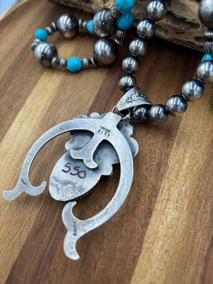Turquoise Naja Pendant by Ned Nez, Navajo