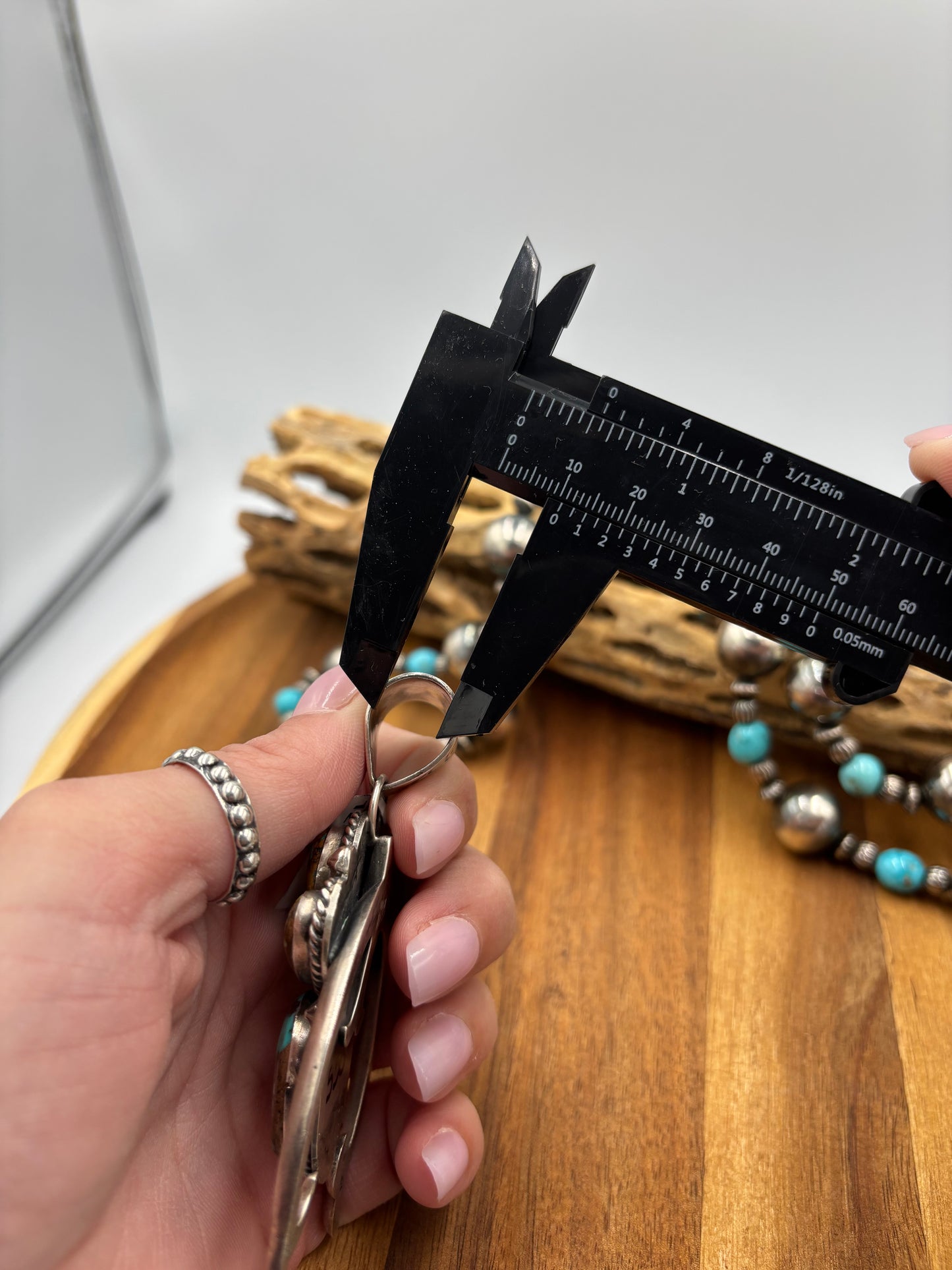 Turquoise Naja Pendant by Ned Nez, Navajo