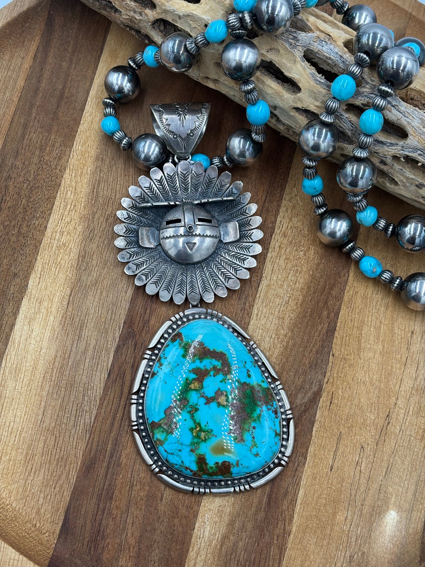 Sonoran Gold Sunface Pendant by F. Charley, Navajo