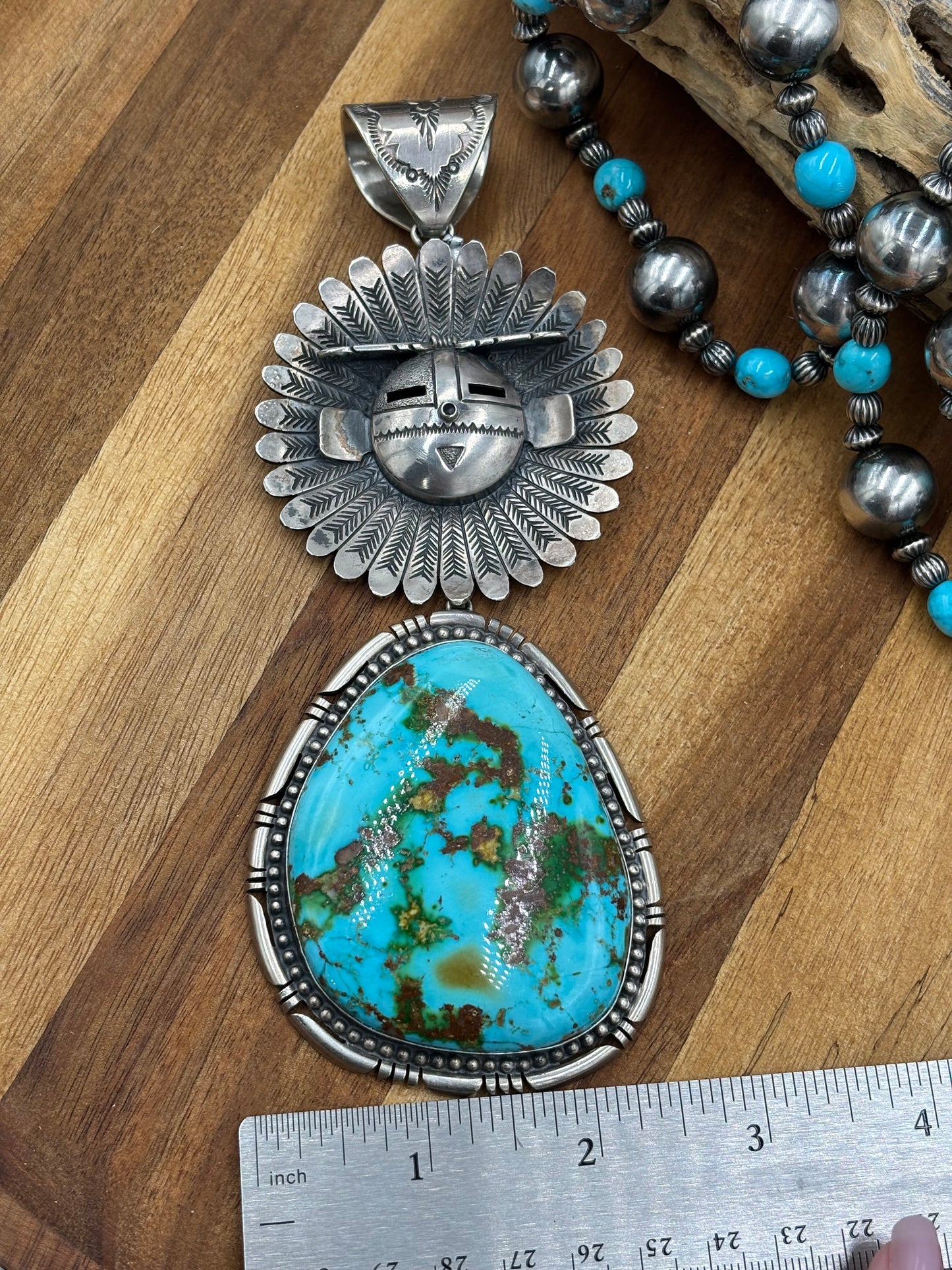 Sonoran Gold Sunface Pendant by F. Charley, Navajo