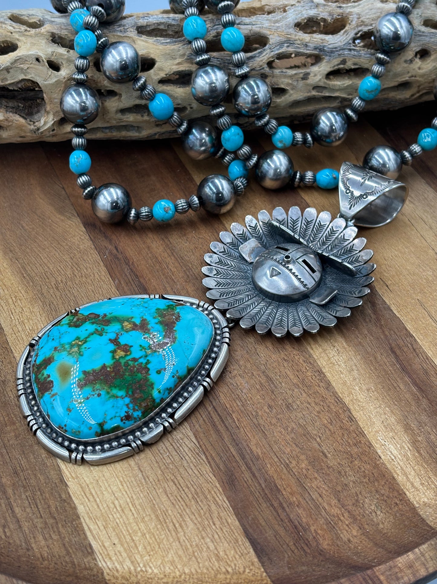 Sonoran Gold Sunface Pendant by F. Charley, Navajo