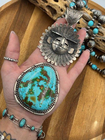 Sonoran Gold Sunface Pendant by F. Charley, Navajo