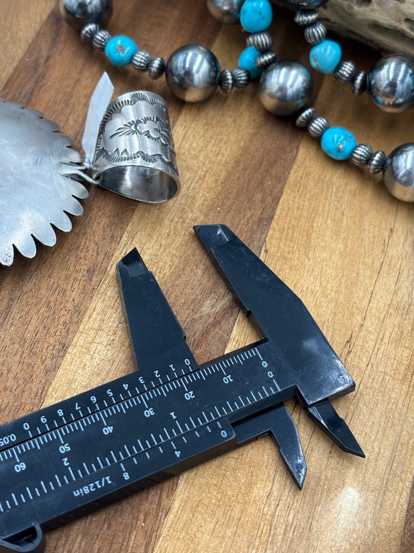 Sonoran Gold Sunface Pendant by F. Charley, Navajo