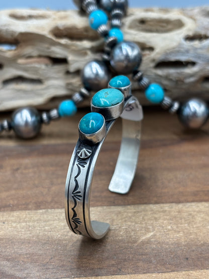 Kingman #108-9 Turquoise Cuff by Rick Enriquez, Navajo