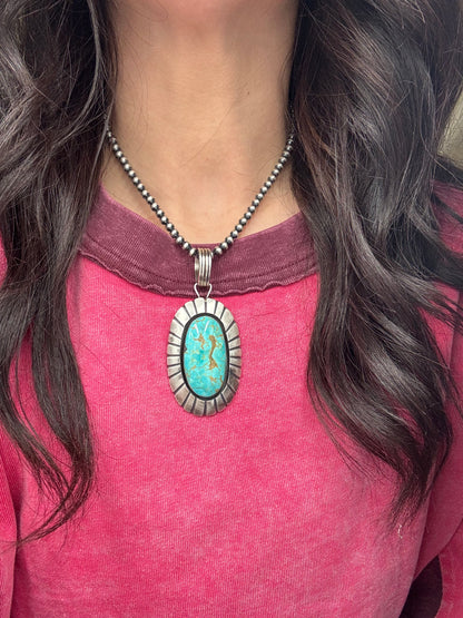 Turquoise Pendant by Jackson Hoskie, Navajo