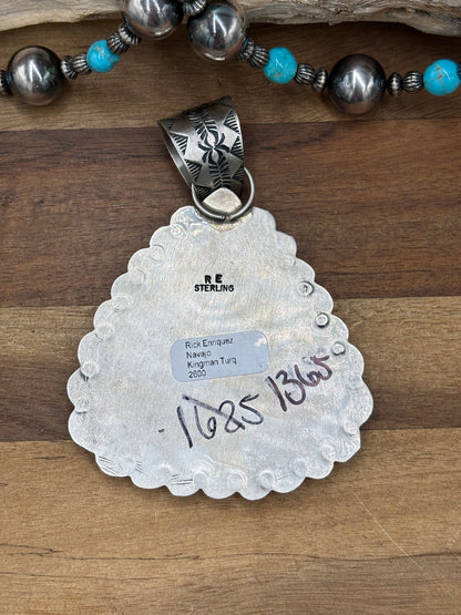 Turquoise #108-16 Pendant by Rick Enriquez, Navajo