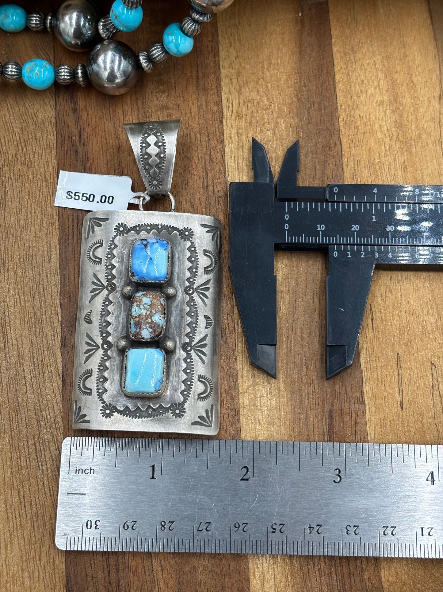 Golden Hills Pendant by Delbert Santos, Navajo