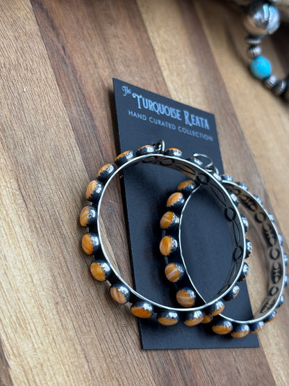Orange Spiny Hoop Earrings by Russell Sam, Navajo