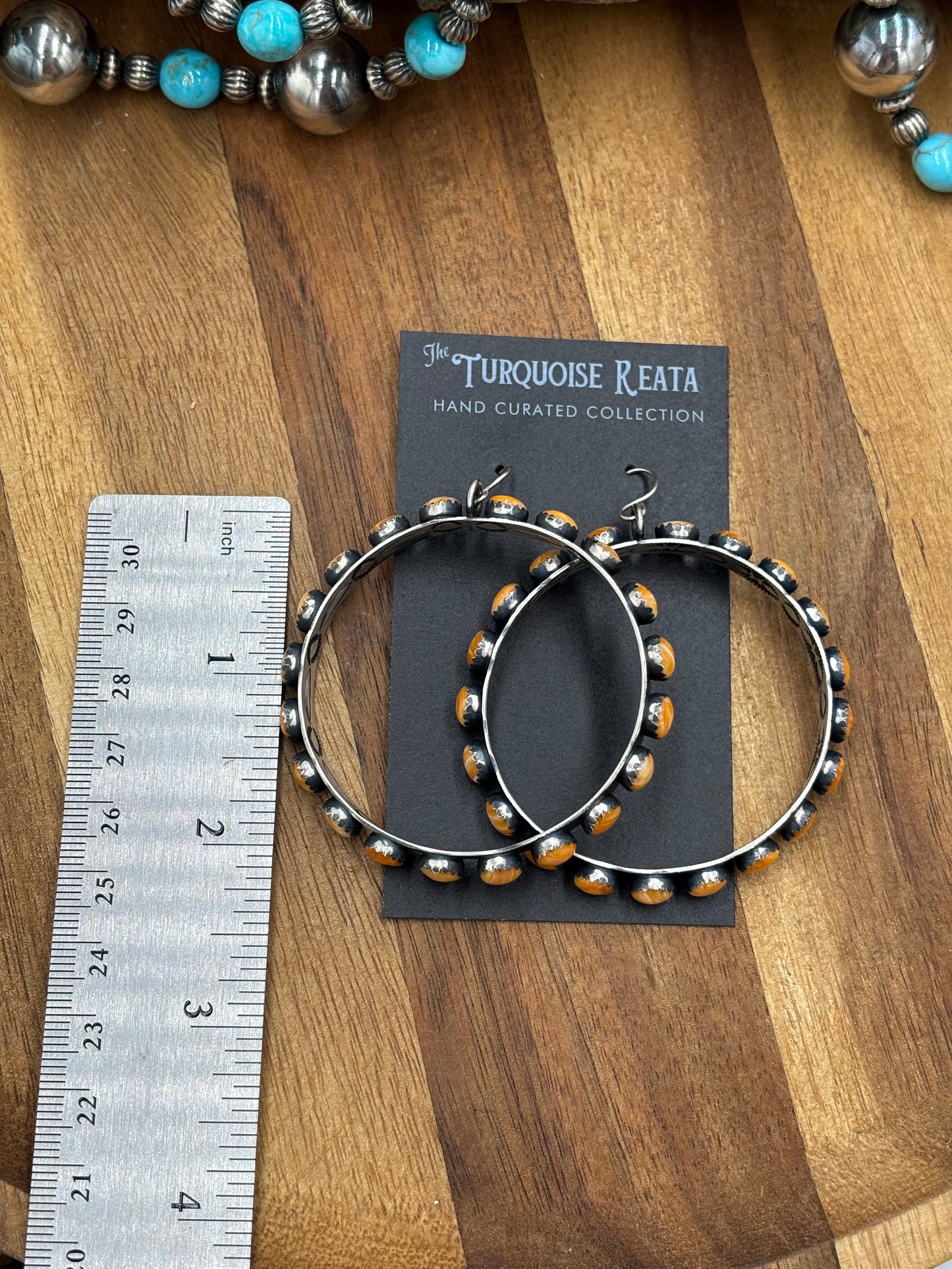 Orange Spiny Hoop Earrings by Russell Sam, Navajo