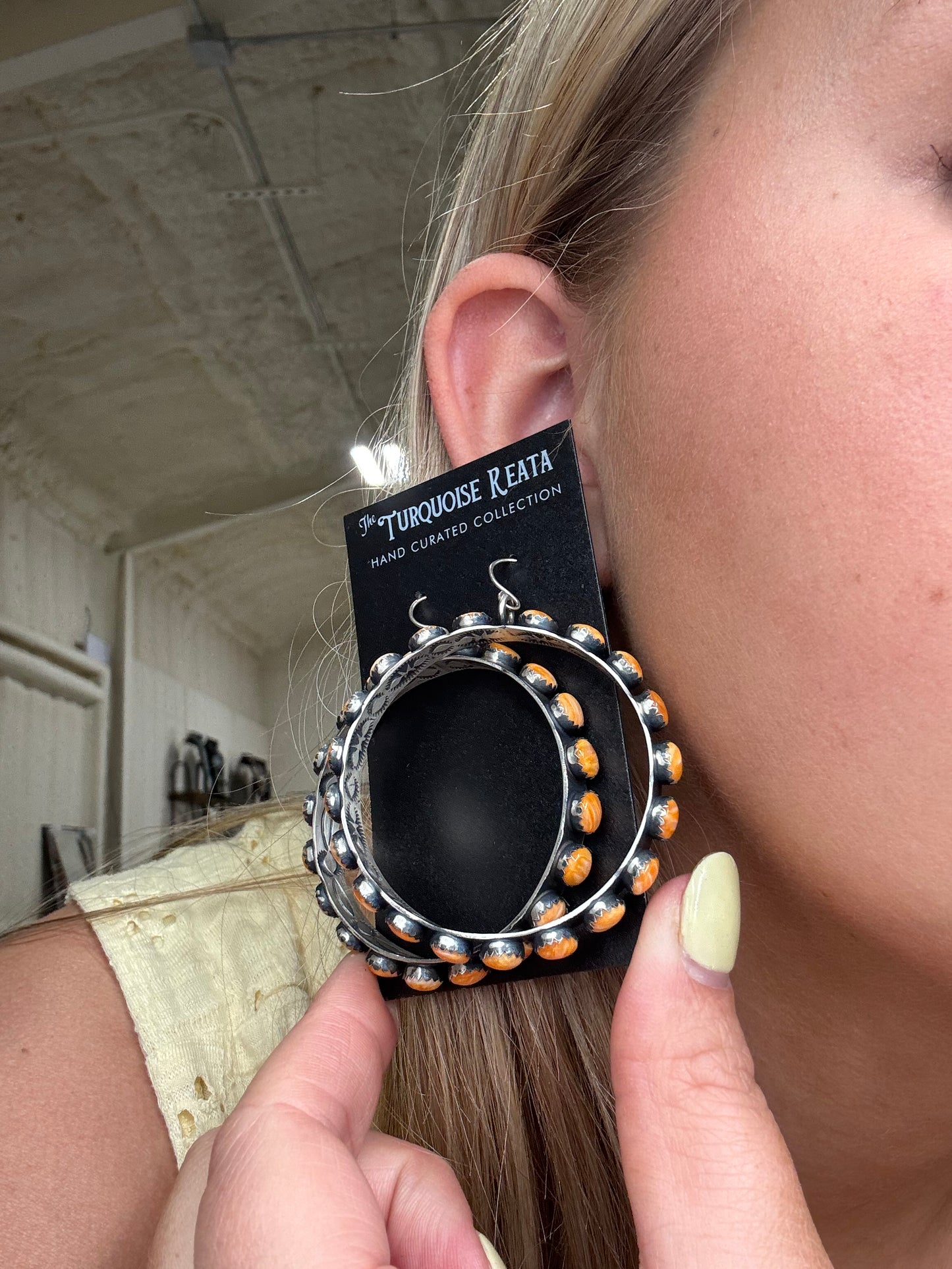 Orange Spiny Hoop Earrings by Russell Sam, Navajo
