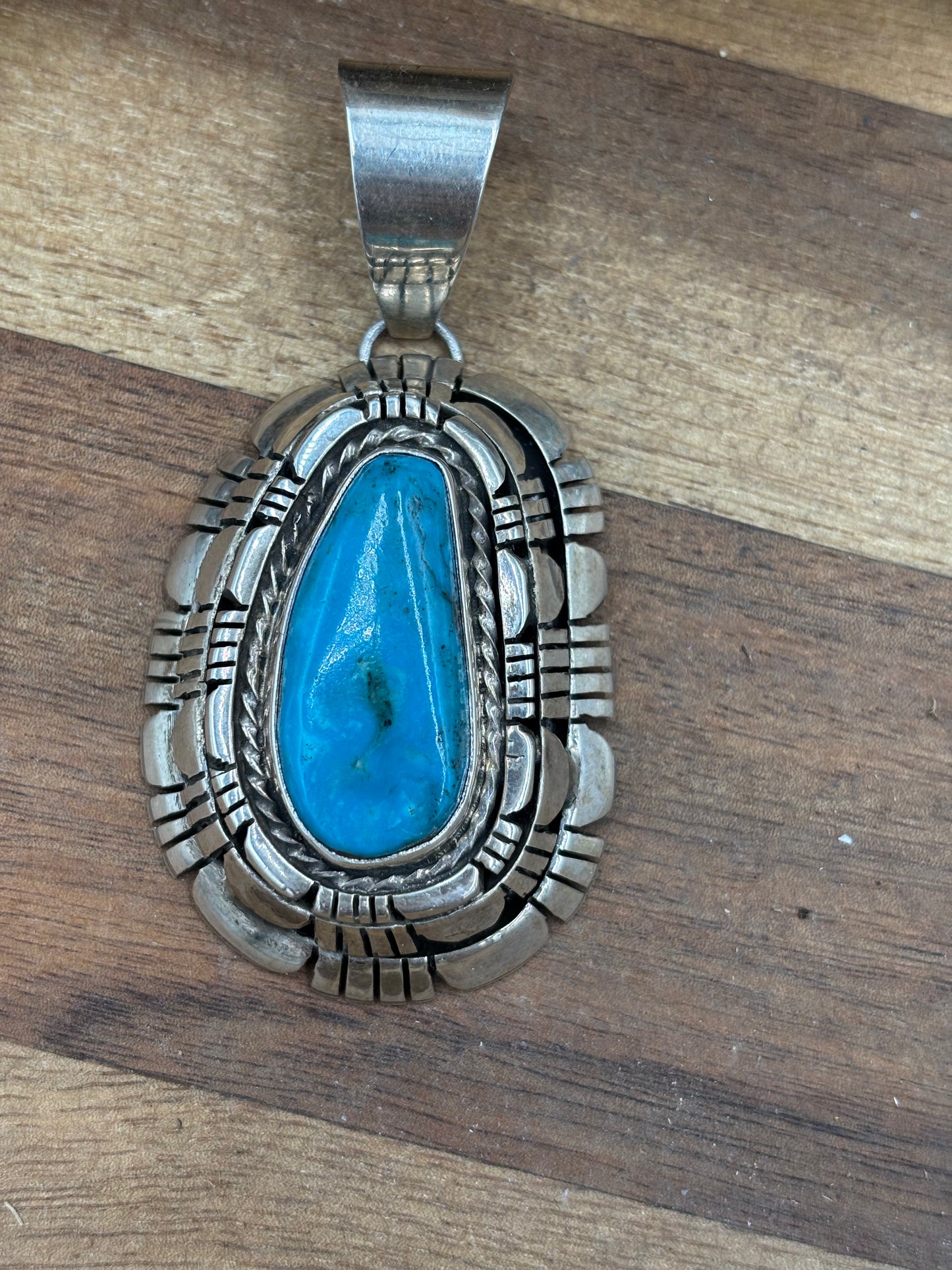 Kingman Turquoise Pendant by Reggie Hoskie, Navajo