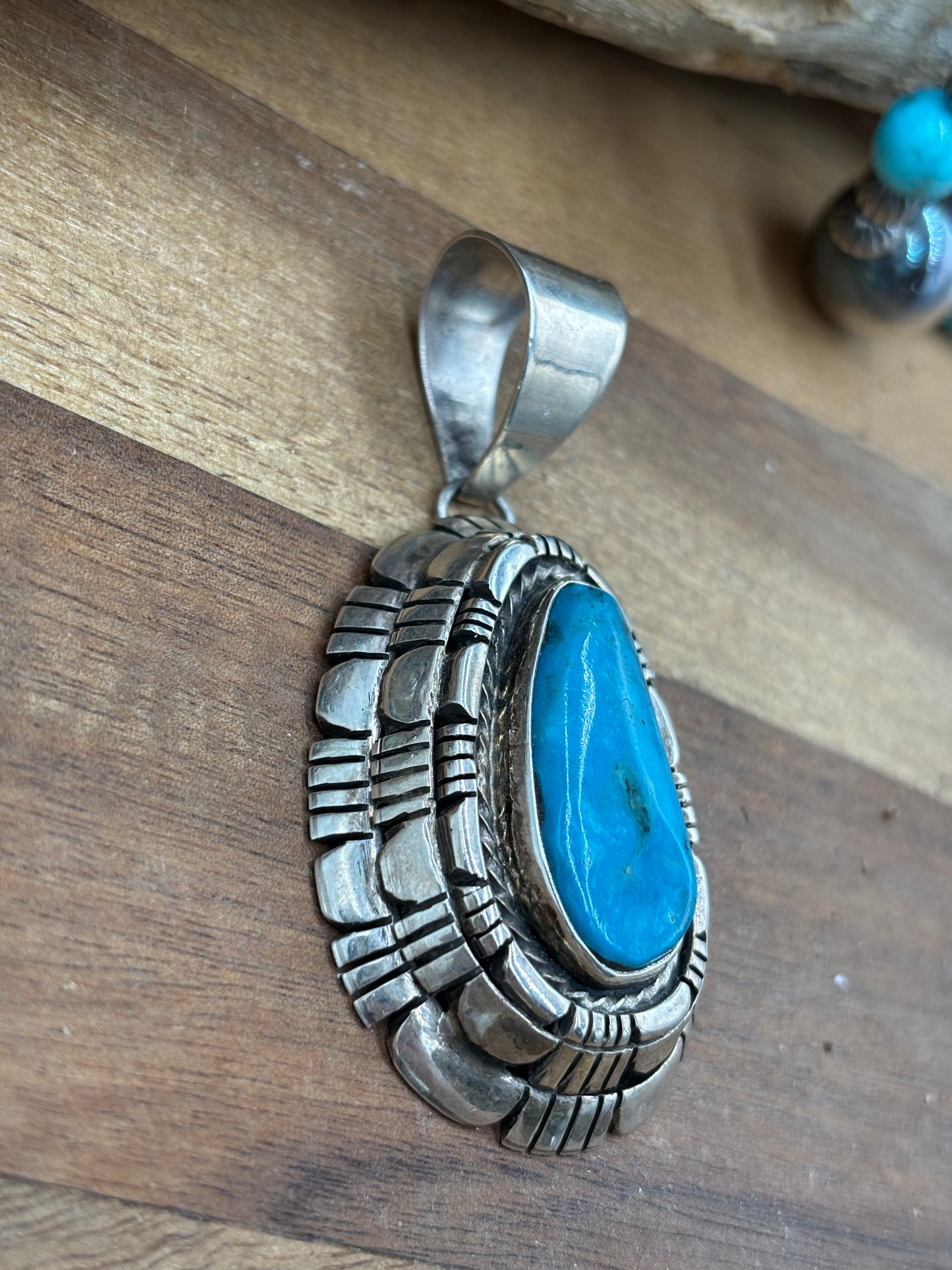 Kingman Turquoise Pendant by Reggie Hoskie, Navajo