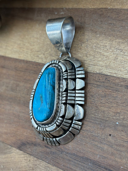 Kingman Turquoise Pendant by Reggie Hoskie, Navajo