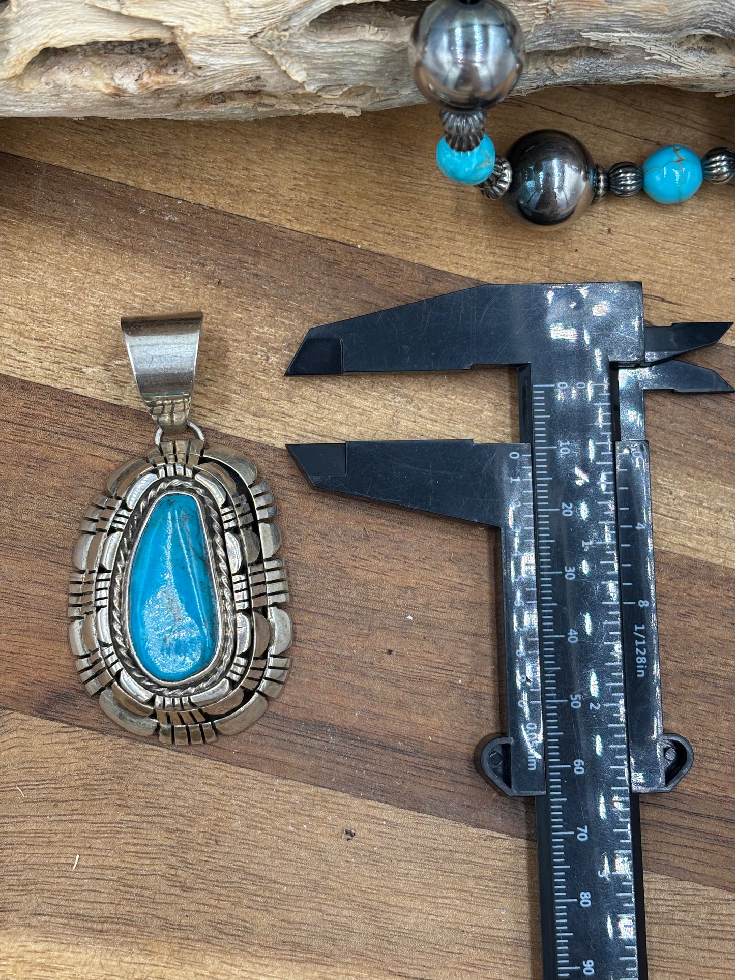 Kingman Turquoise Pendant by Reggie Hoskie, Navajo