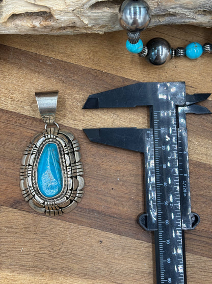 Kingman Turquoise Pendant by Reggie Hoskie, Navajo