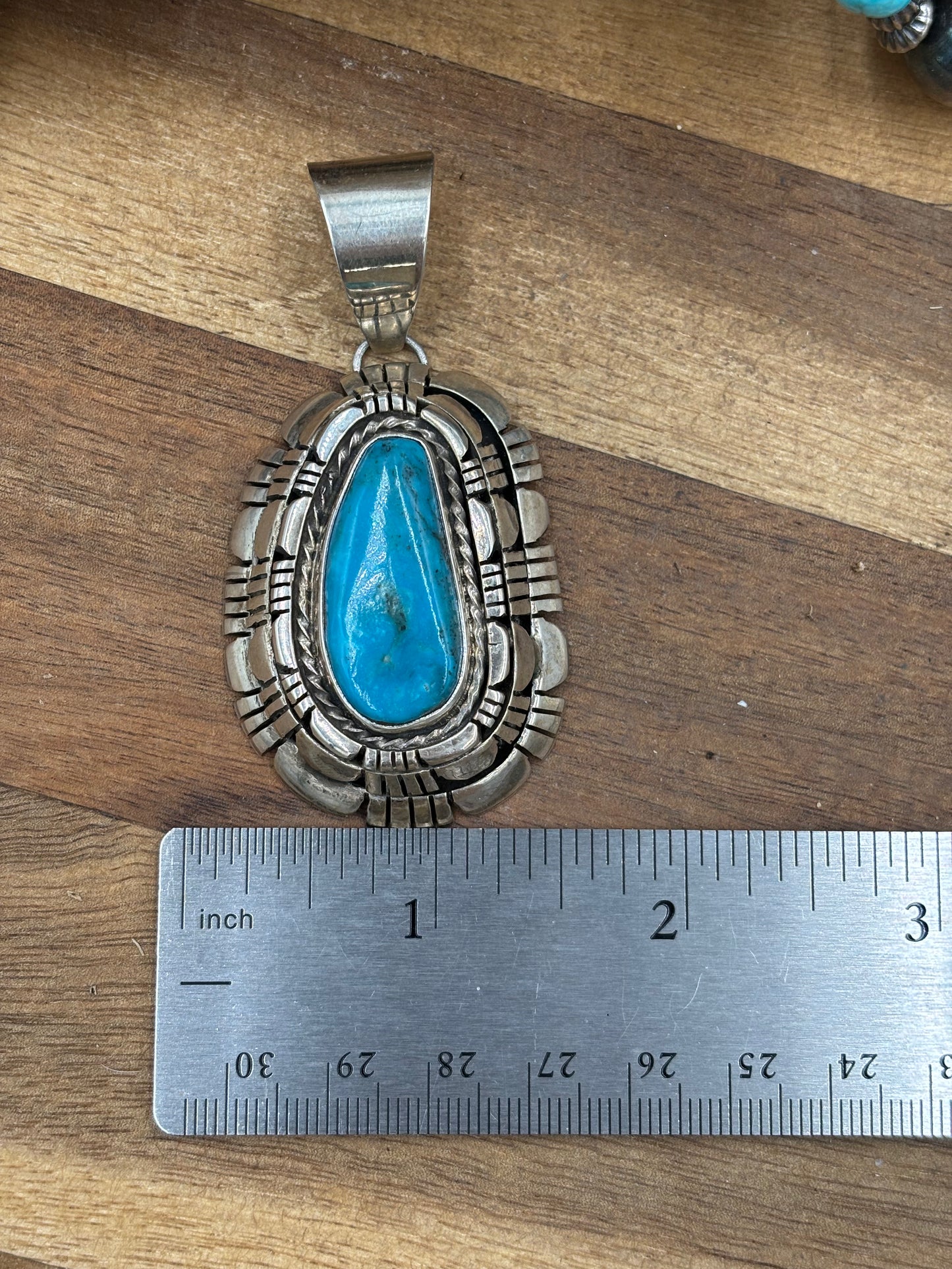 Kingman Turquoise Pendant by Reggie Hoskie, Navajo