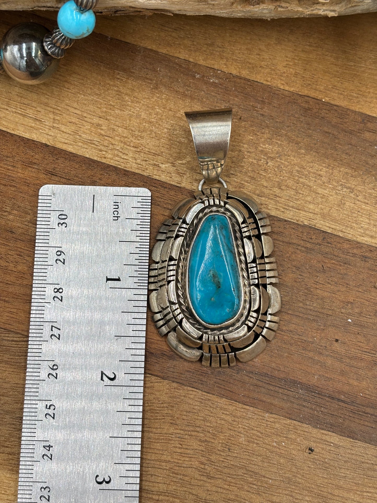 Kingman Turquoise Pendant by Reggie Hoskie, Navajo