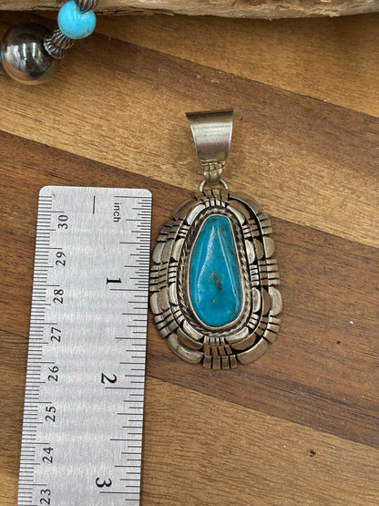 Kingman Turquoise Pendant by Reggie Hoskie, Navajo