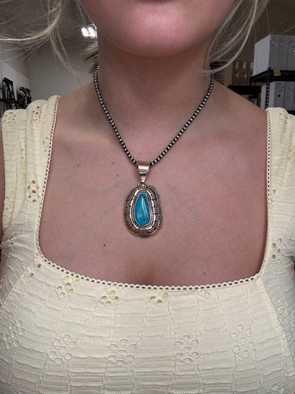 Kingman Turquoise Pendant by Reggie Hoskie, Navajo