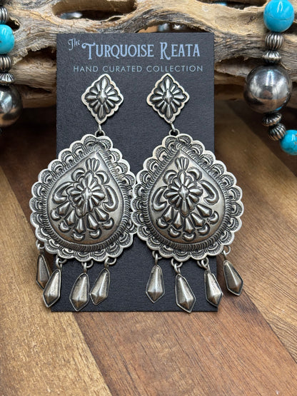 Concho Earrings by Thomas Charley, Navajo