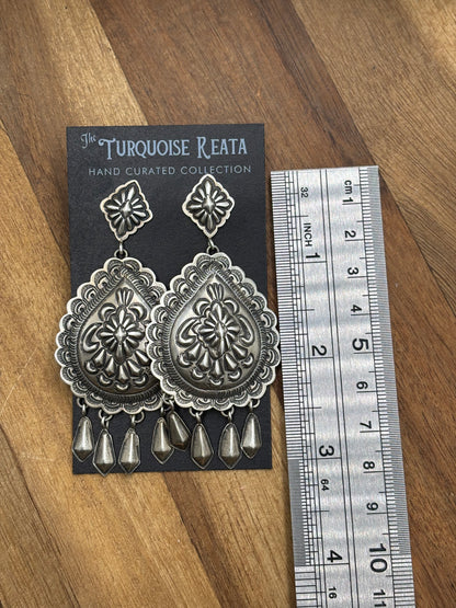 Concho Earrings by Thomas Charley, Navajo