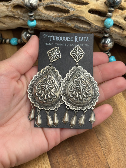 Concho Earrings by Thomas Charley, Navajo
