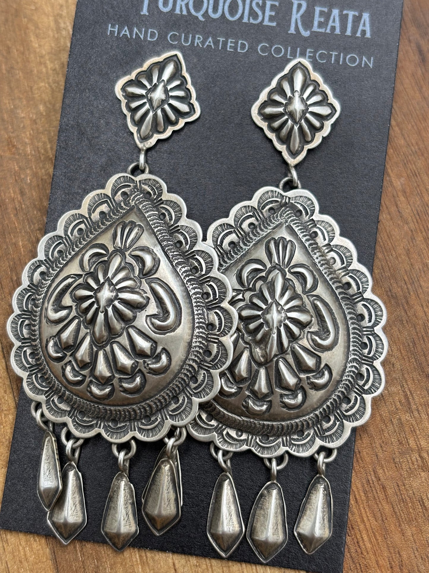 Concho Earrings by Thomas Charley, Navajo