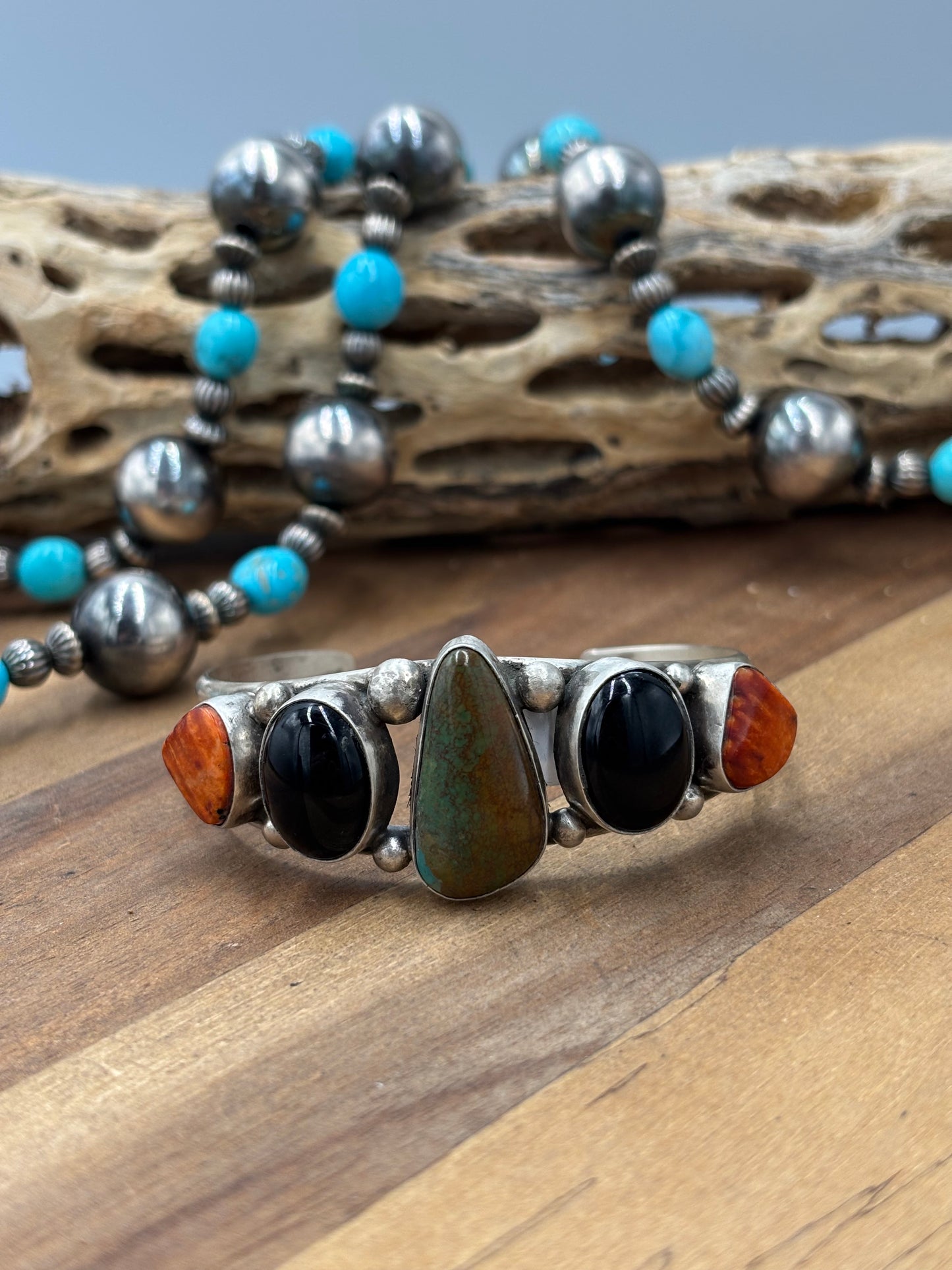 Kingman #96-13 Black Onyx, Orange/Red Spiny Cuff by Augustine Largo, Navajo