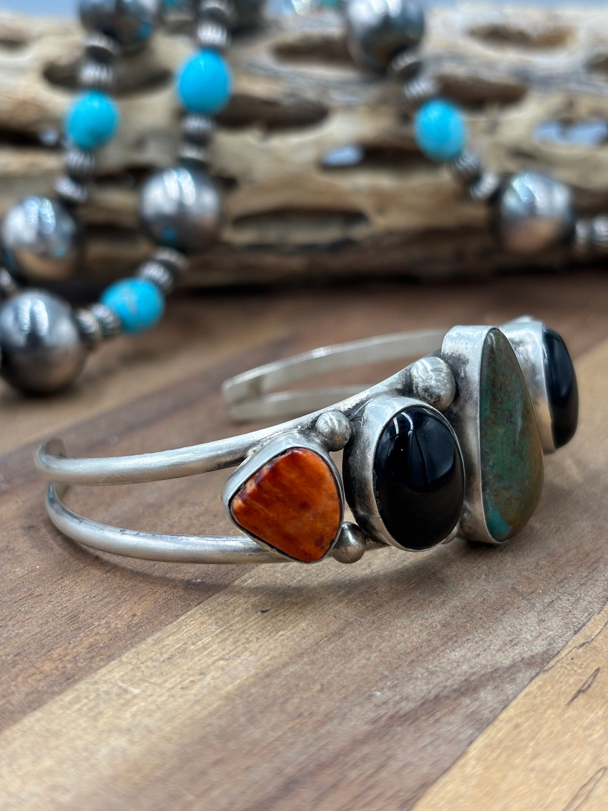 Kingman #96-13 Black Onyx, Orange/Red Spiny Cuff by Augustine Largo, Navajo
