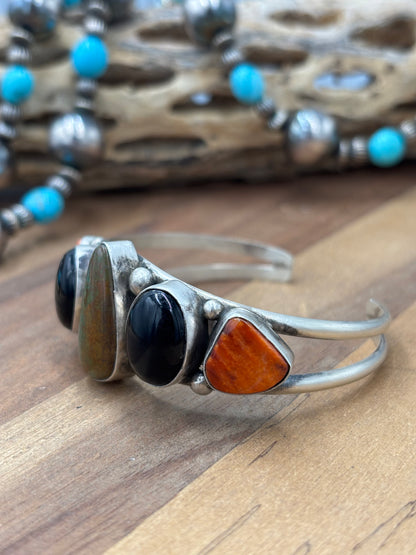 Kingman #96-13 Black Onyx, Orange/Red Spiny Cuff by Augustine Largo, Navajo