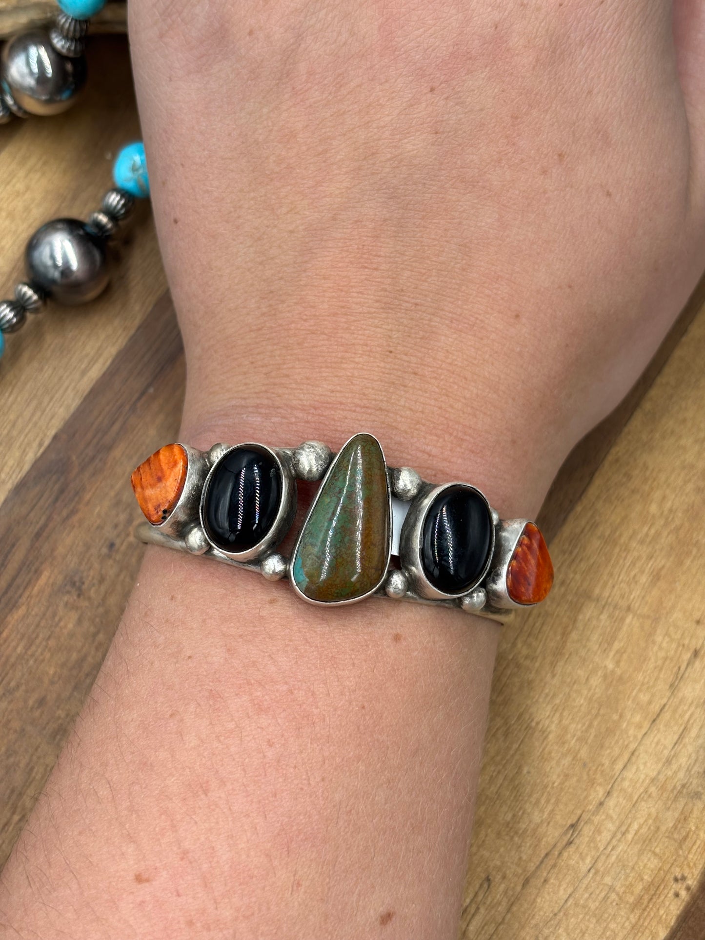 Kingman #96-13 Black Onyx, Orange/Red Spiny Cuff by Augustine Largo, Navajo
